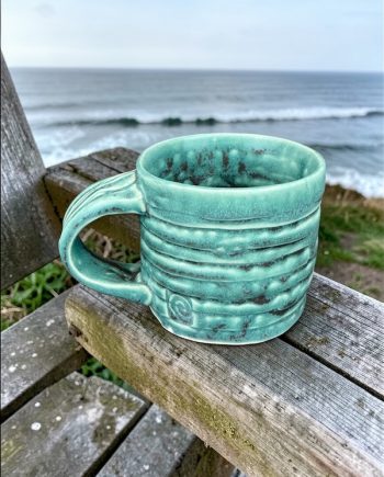 Shoreline Moment Near Shore mug with layered green glaze
