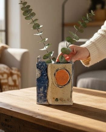 Lake Michigan ceramic vase with textured porcelain surface and shoreline sand glaze