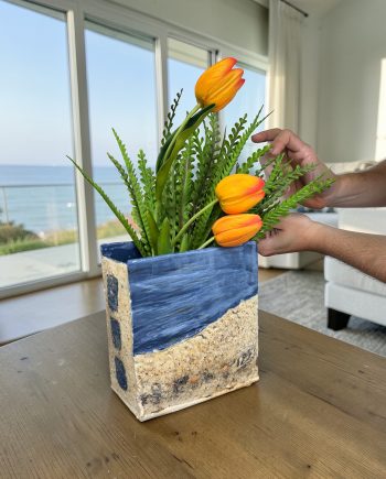 Windows to the world handmade vase with flowers