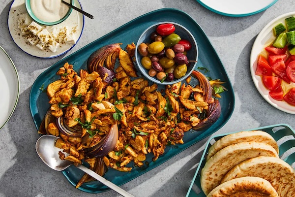 Chicken shawarma made in the oven with spices, garlic, and lemon—an easy, flavorful meal that comes together with just a little planning ahead.